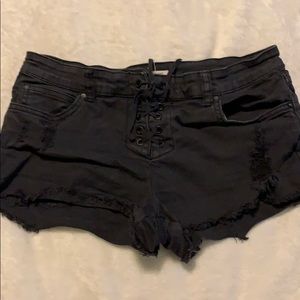 Distressed black denim shorts